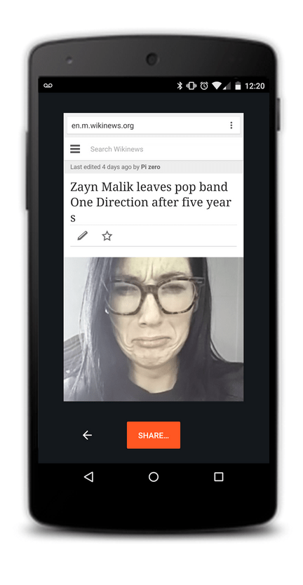 Smartphone displaying a Wikinews article about Zayn Malik leaving One Direction as an April Fools spoof