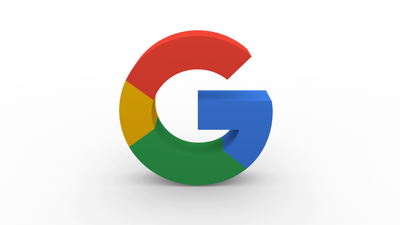 3D rendered Google G logo in red, blue, yellow and green on a white background
